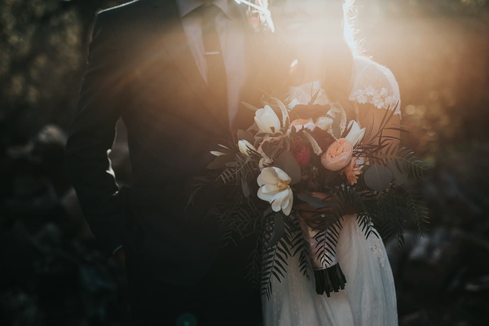 A couple walking together on their wedding day